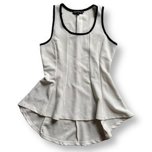 White & black peplum fit flair high low tank top